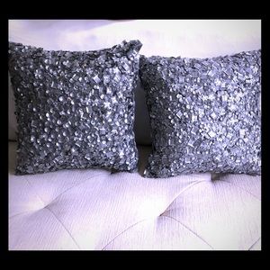 Two silver beaded pillows